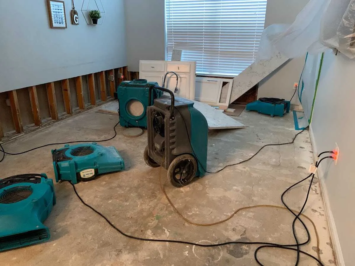 Dehumidifier in flood-cut room for Water Damage Restoration in Bergenfield